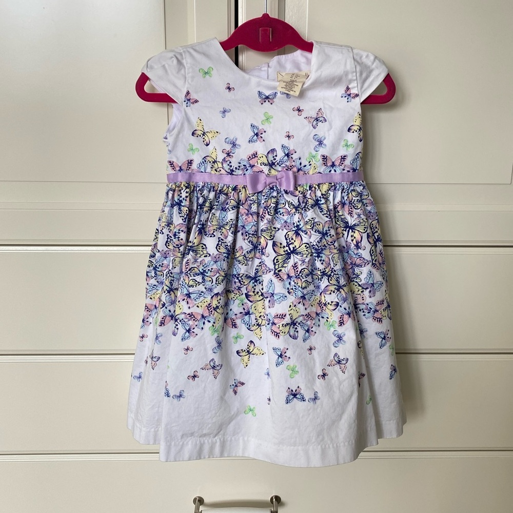 Spring like little girls dress with butterflies.